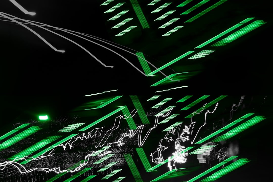 a black and white photo with green lights